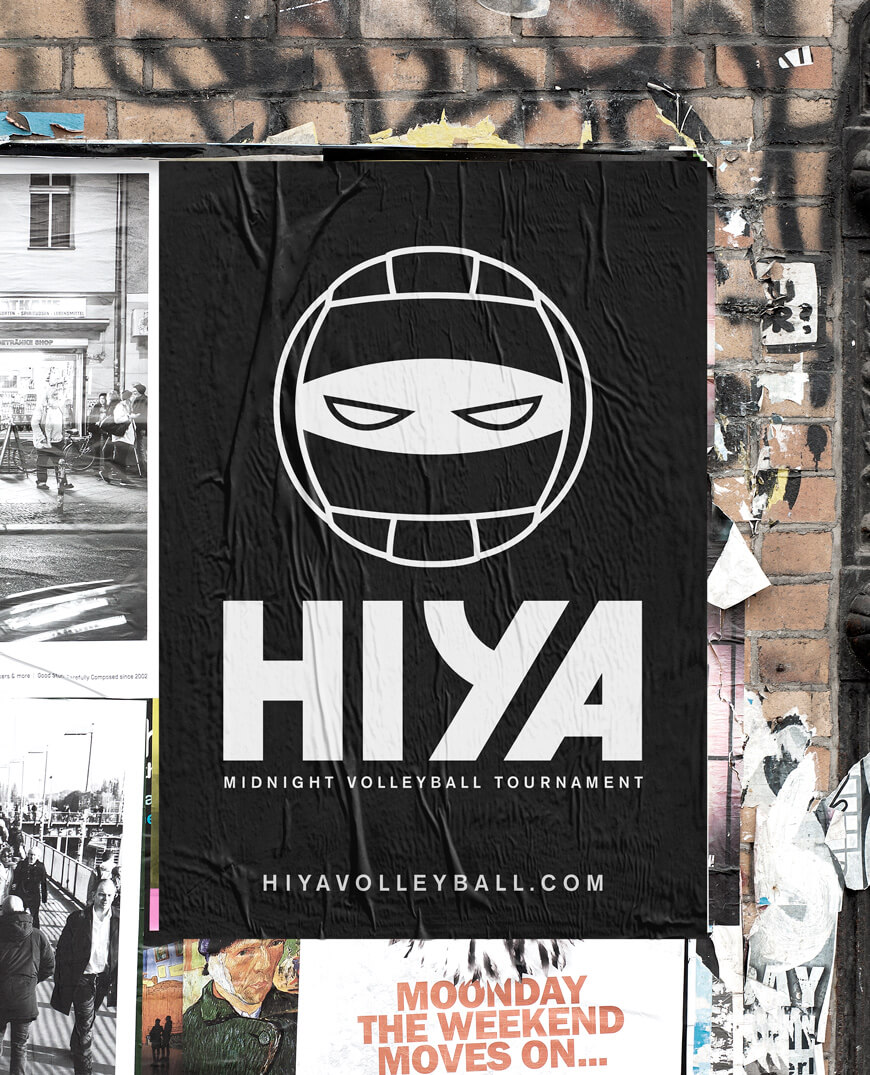 hiya-volleyball-urban-poster Black wheatpaste poster with icon of volleyball combined with ninja eyes and HIYA text underneath