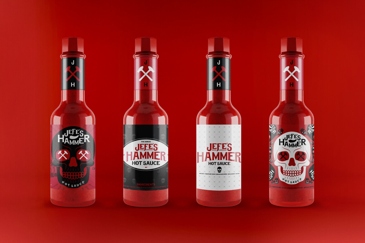 jefes-hammer-bottle-samples-all Photo of four bottles with different labels lined up next to each other on red background