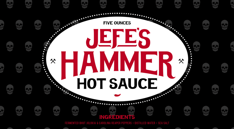 jefes-hammer-label-A Sauce bottle black label with bespoke hammer pattern in background and large red logo text sitting inside white circle in center